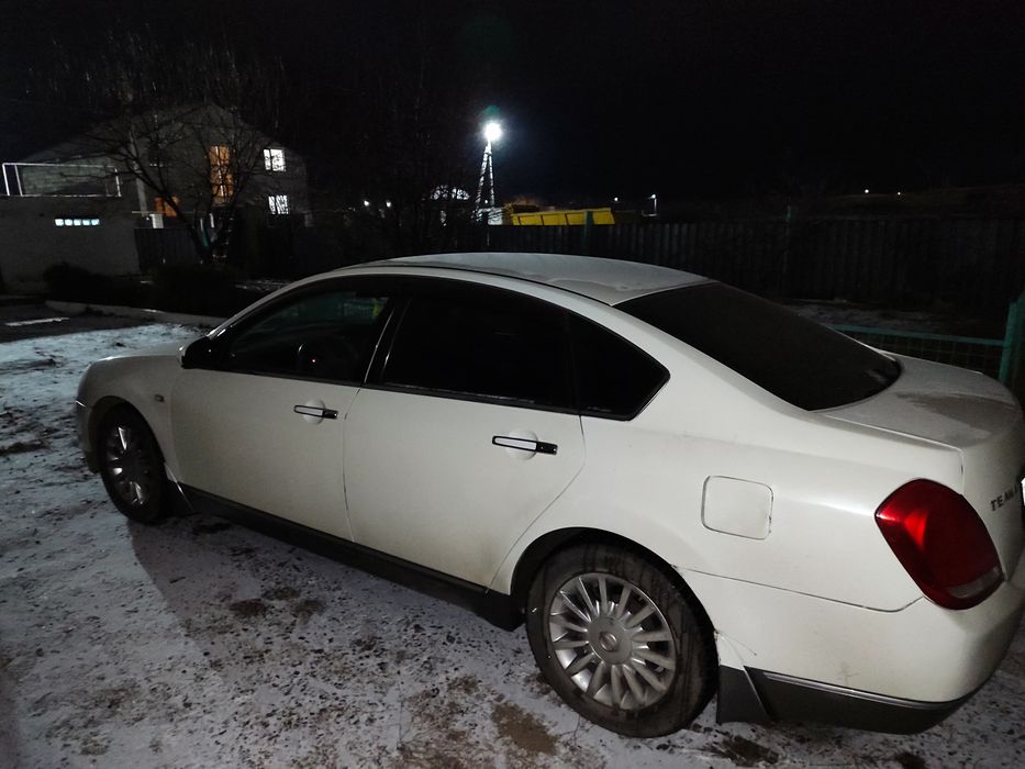 Автомобиль Ниссан Теана