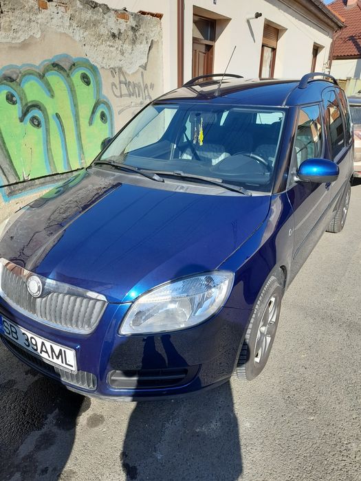 Vând Skoda Roomster