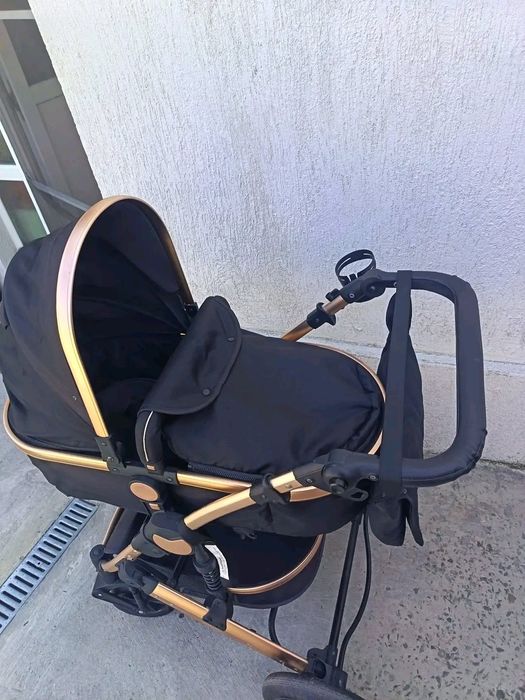 Carucior 3 in 1 cu suspensii duble