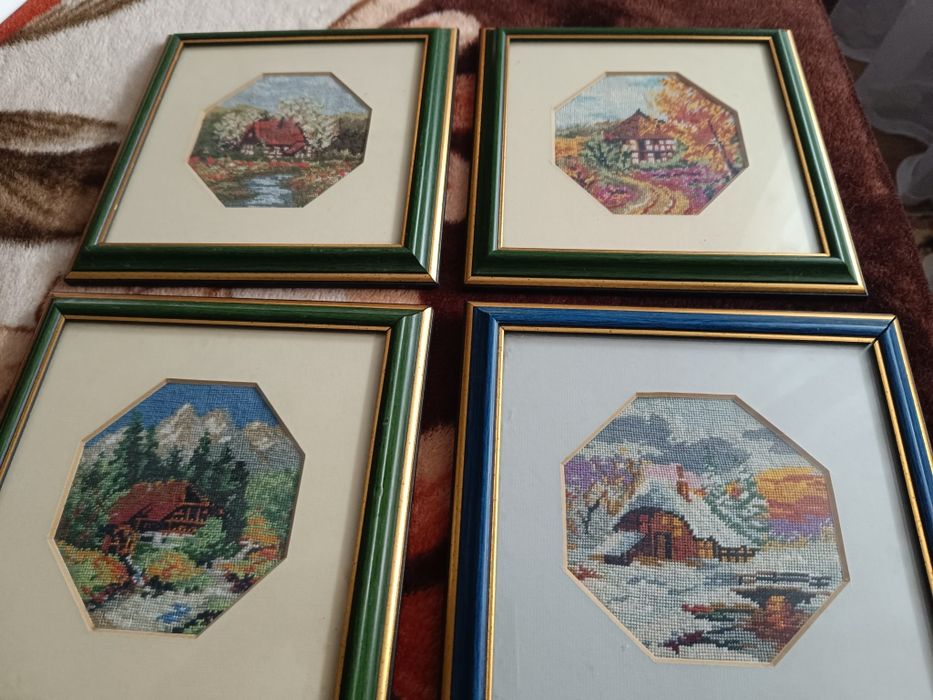 Patru goblenuri inramate profesional, reprezentand anotimpurile.