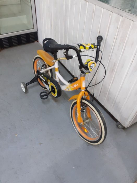 Колело с помощни гуми