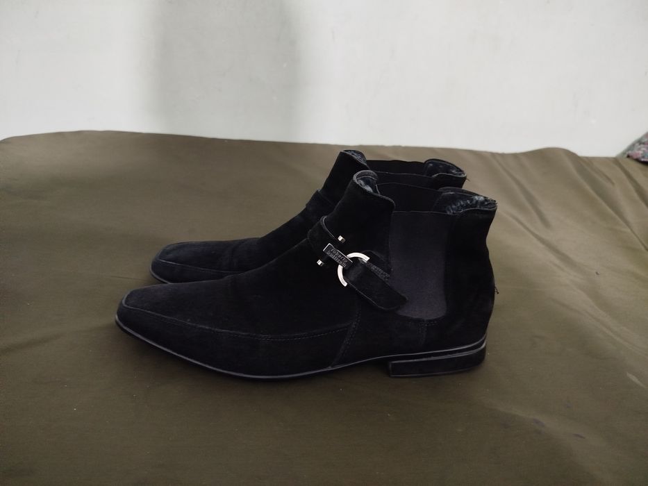 Продам фирменные сапоги.