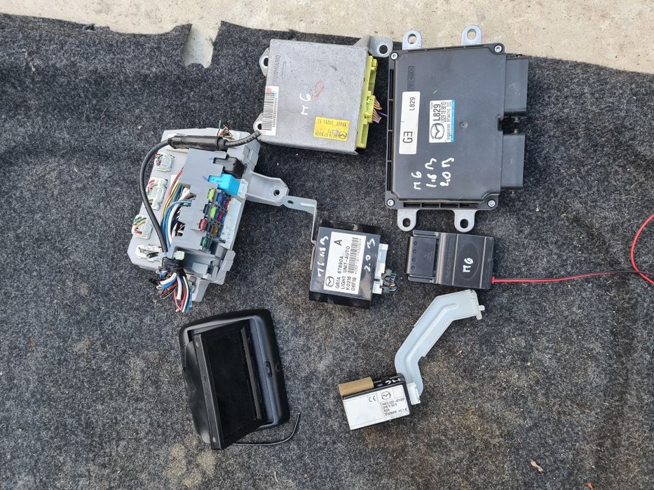 Radio cd,stopuri,ceasuri bord,climatronic Mazda 6 combi