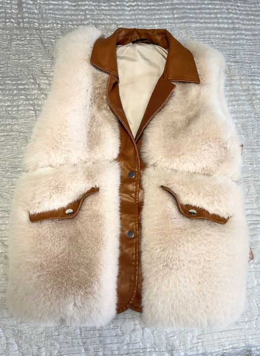 Дамски пухен елек