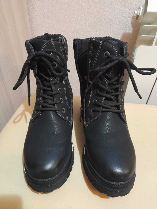 Продам новые зимние ботинки