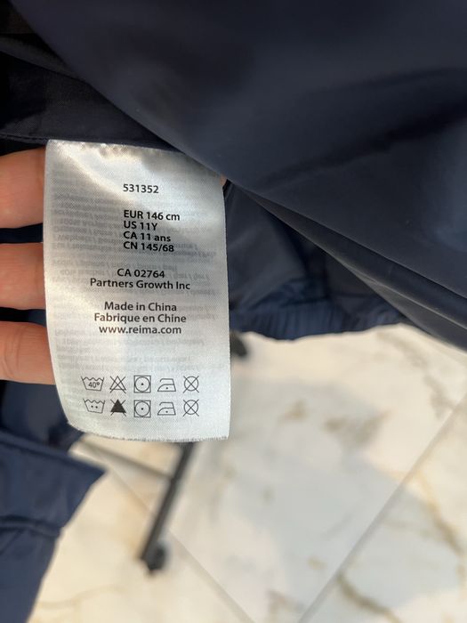 Пуховик Reima на 146 см.