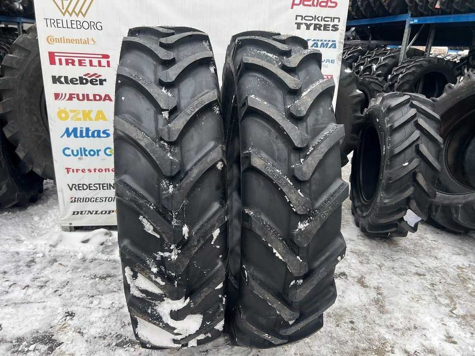 Cauciucuri marca FORERUNNER 15.5-38 cu 12 pliuri pentru tractor