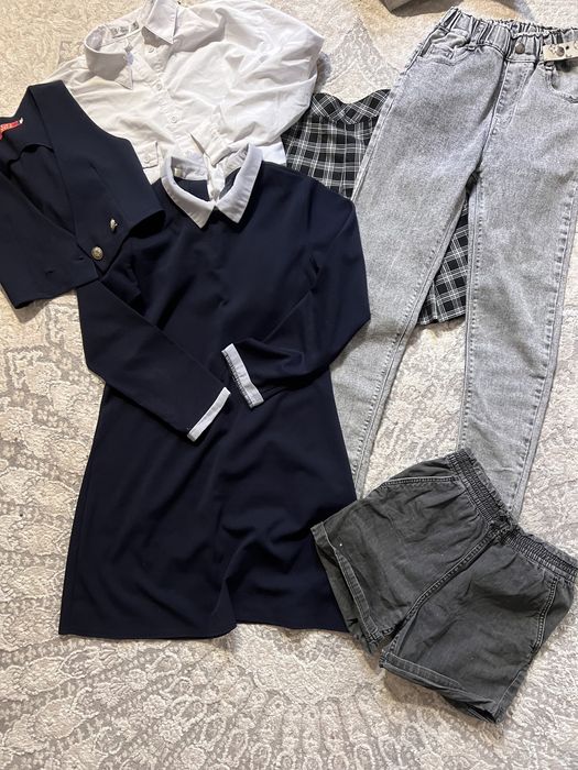 Пакет одежды на девочку лет 7-9