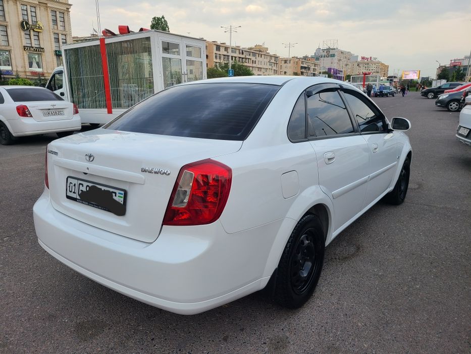 Lasetti 2004 yil 59000 km yurgan kiraska toza  moshina ideal