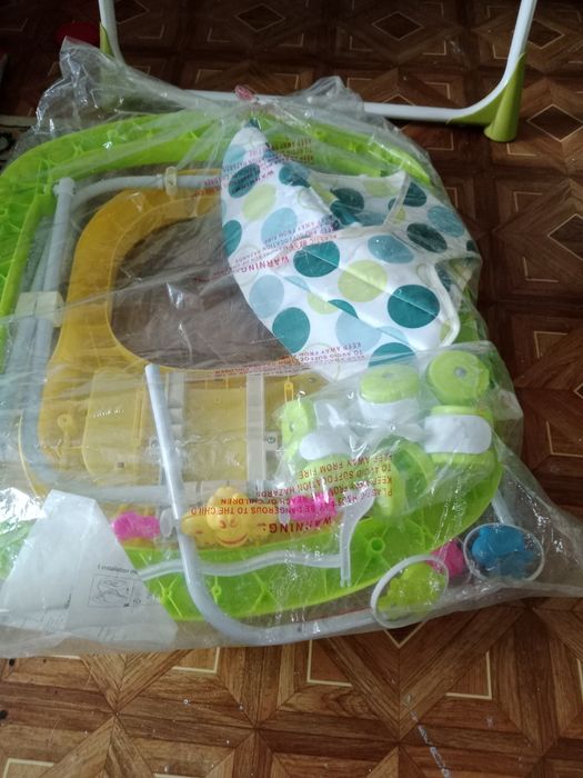 Срочна продам качеля в подорок ходунок.