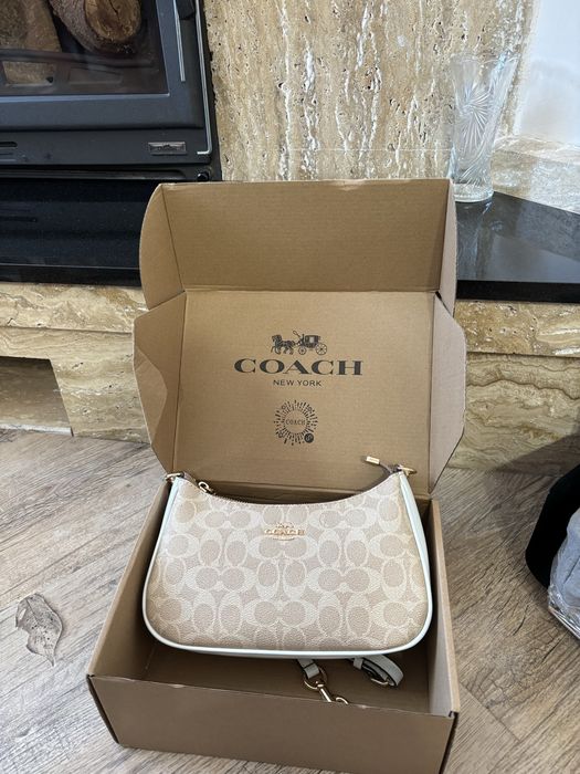 Geantă coach impecabilă