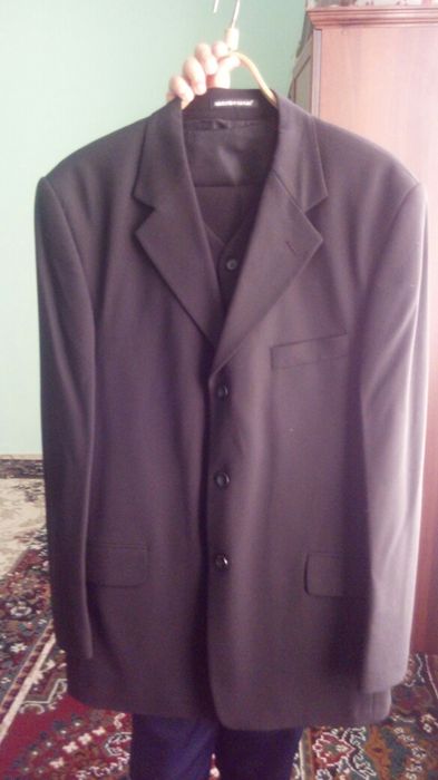 Костюм брюки муж яхши холатда.