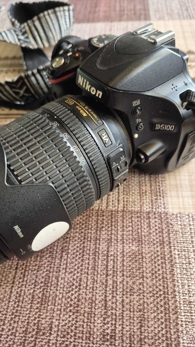 Nikon D5100, окомплектован с един от най-добрите и универсални обективи в този клас: AF-S DX Nikkor 18-105mm f/3.5-5.6G ED VR