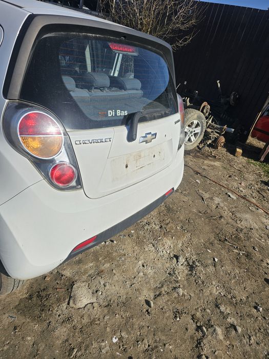 Dezmembrez  Chevrolet spark 2012 piese motor cutie uși haion aripi