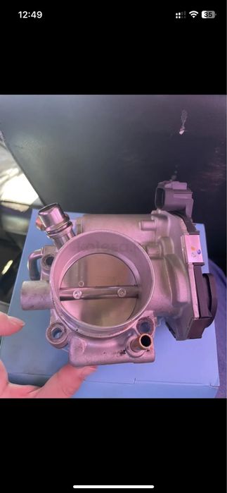 Продам дроссельную заслонку