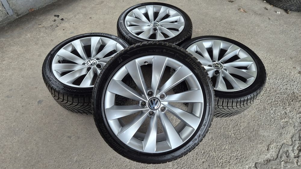 VW 18 цола 5x112 8J ET41 ц.о.57.1  със зимни гуми 235 40 18 Bridgeston