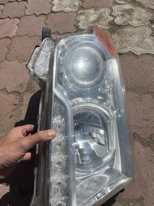 Фара левая крузак 200