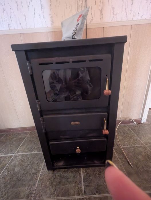 Печка отоплителна,тип камина