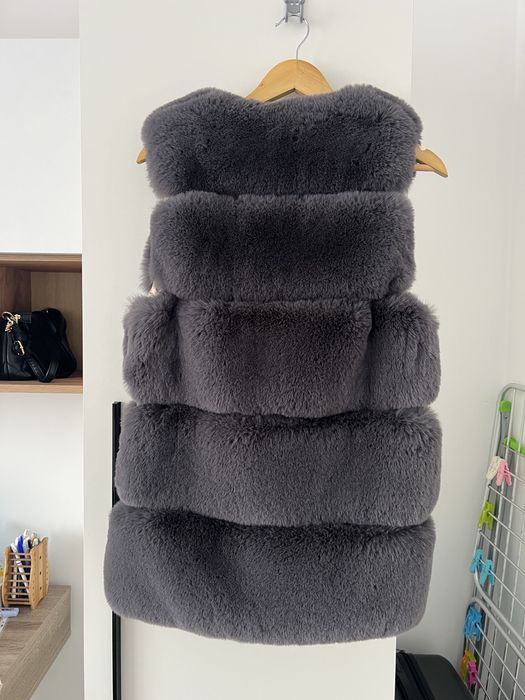 Vesta cu blana copii
