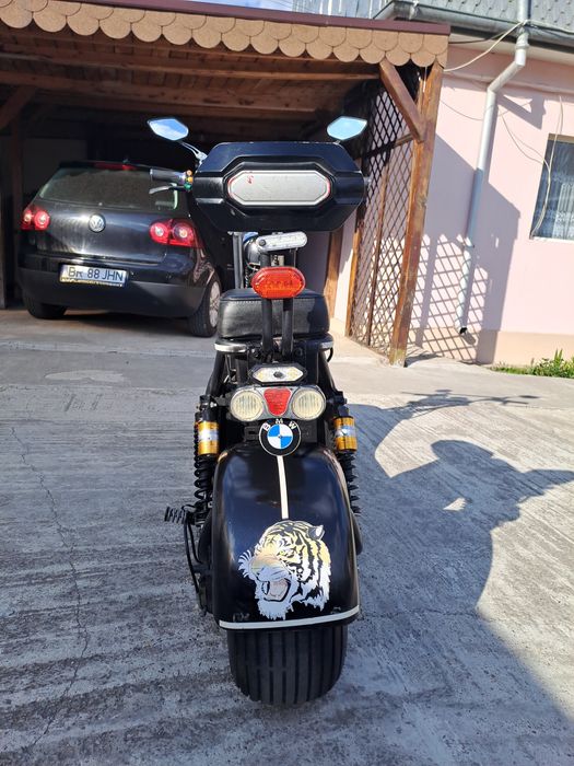 Vand motoscuter electric