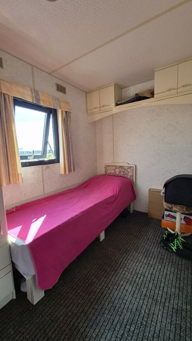 Teren 750 m.  si casa mobila