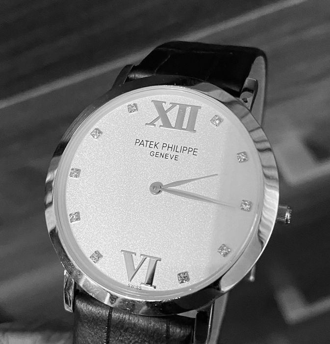 Часы Patek Philippe. Uni.