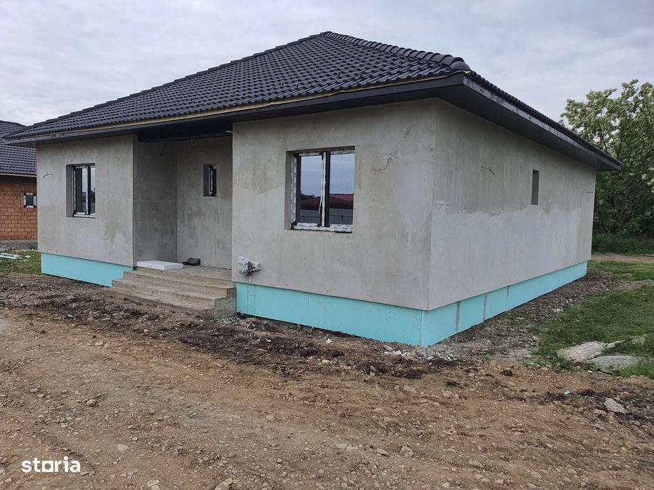 Casă la cheie pe 1 nivel 4 camere 2 băi,145 mp,500 mp teren