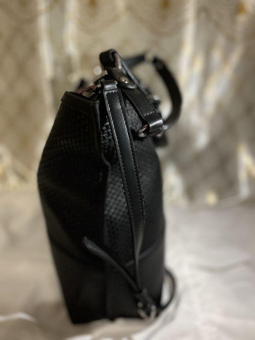 Geanta de umar kevin clain