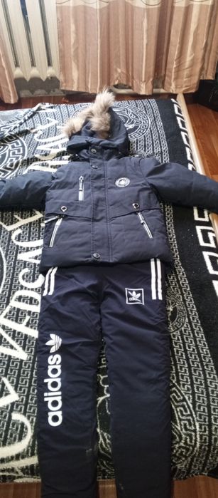 Продам детские комбинезоны