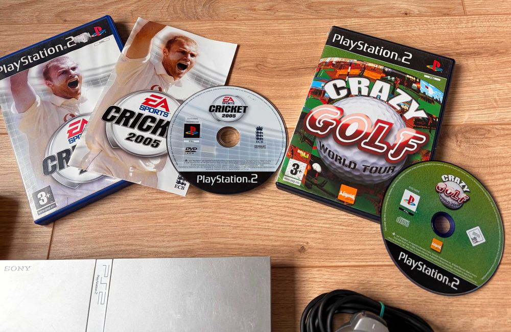 PS2 Slim Silver PlayStation 2 + подарък 6 игри и два контролера