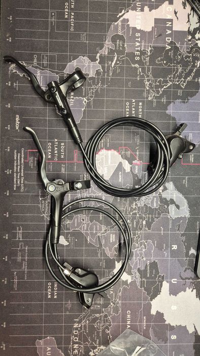 Frâne hidraulice Shimano MT200 față + spate – plăcuțe noi
