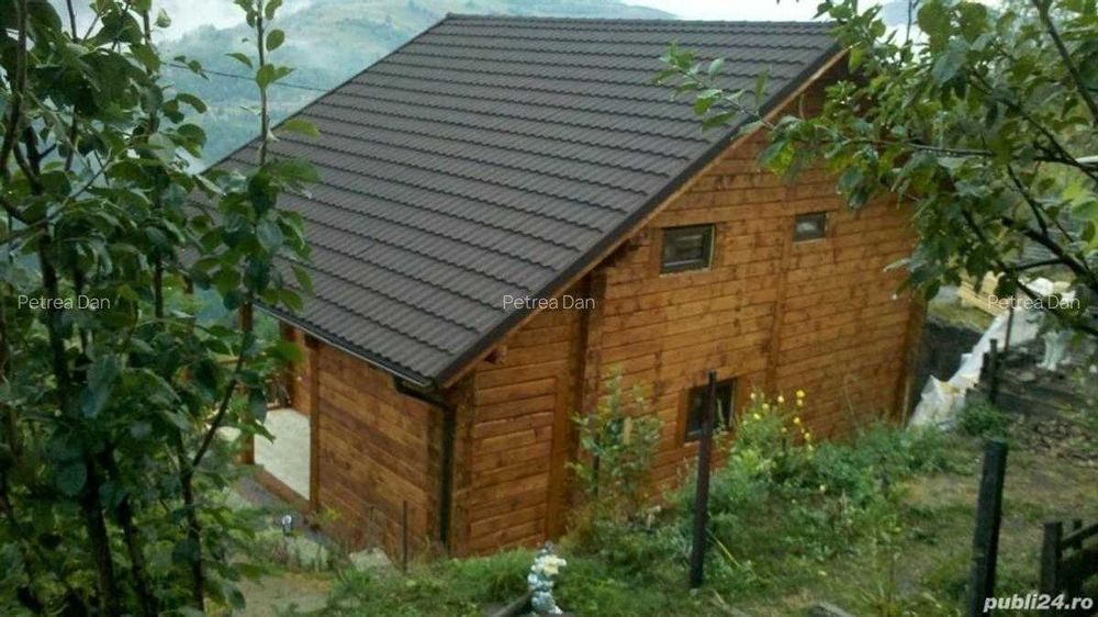 Casa din lemn masiv cu teren in Muntele Rece