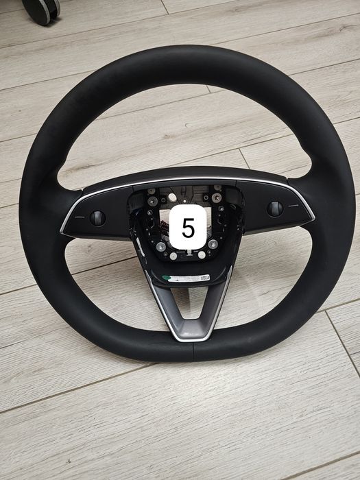 Volan Tesla originale sau retapitate Model 3, Highland