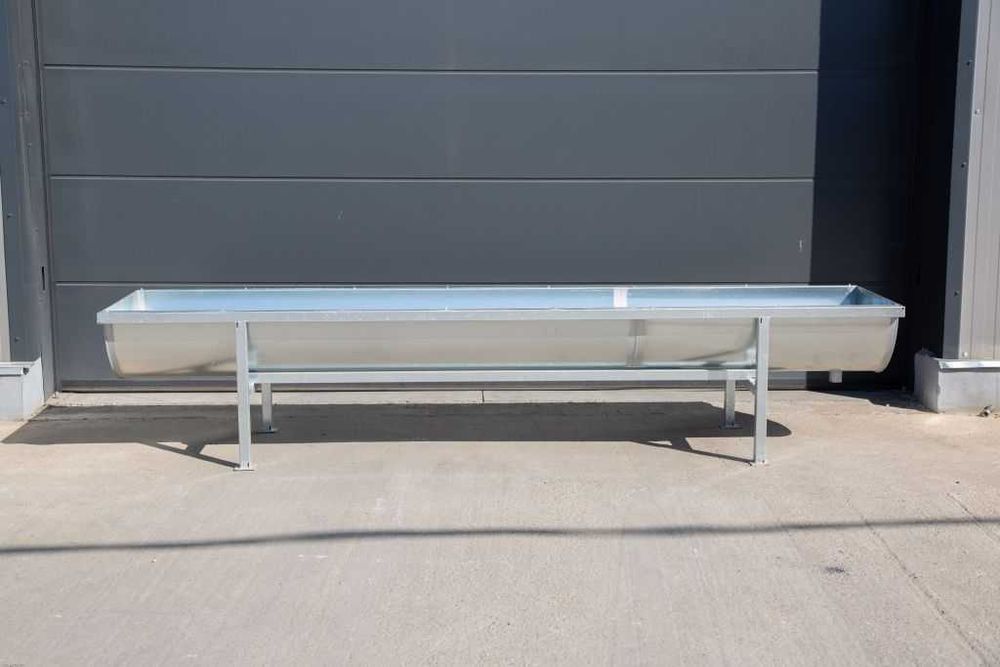 Long galvanized cattle water trough