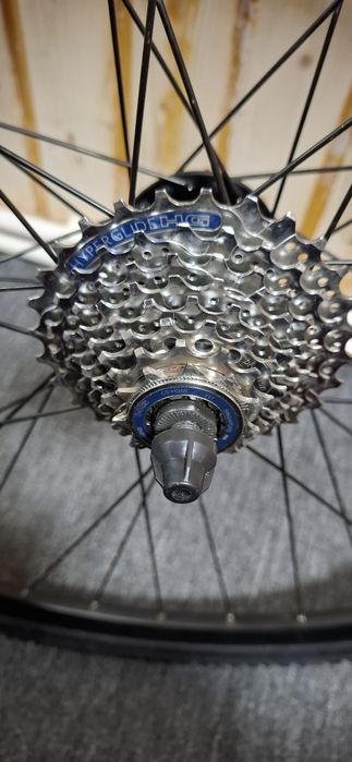 Set roți 28" Alexrims G6000 + butuci Shimano + casetă HG50 8 viteze + disc