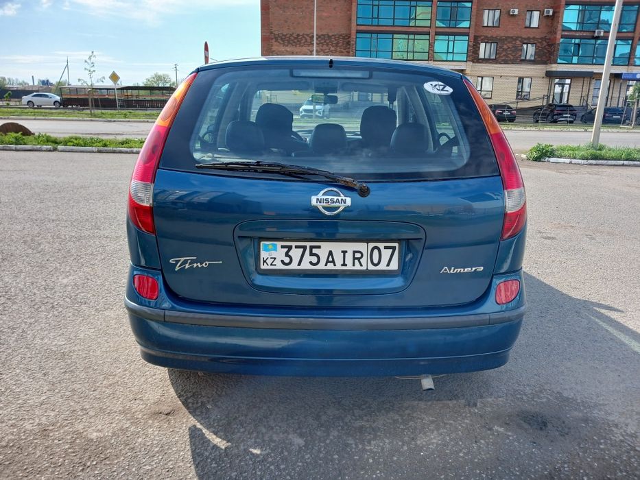 Ниссан альмера тино!