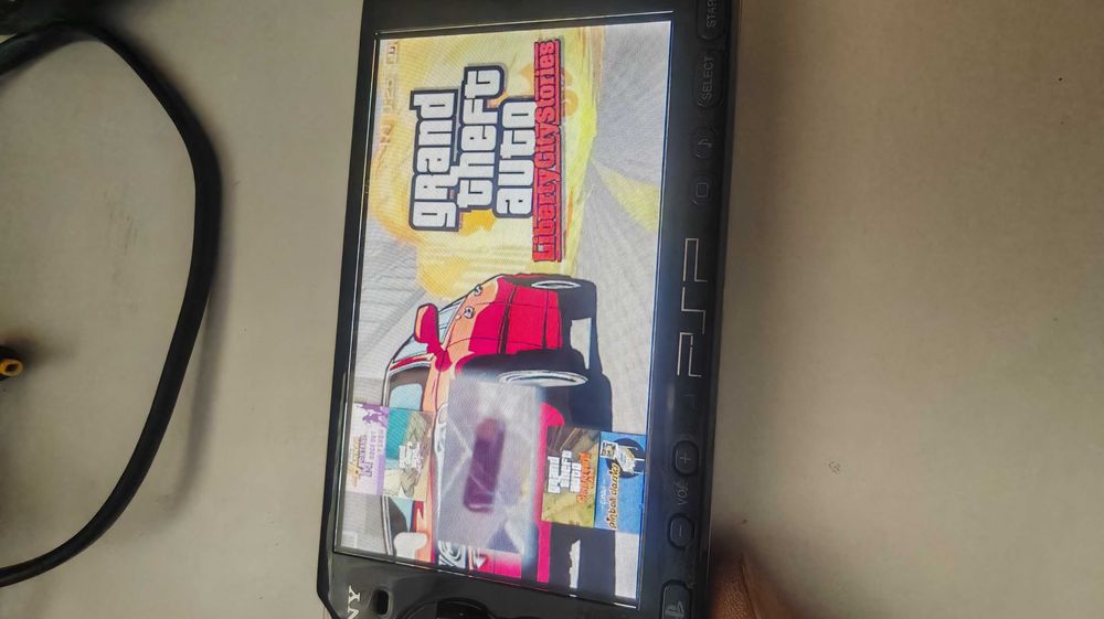 Playstation PSP modat, cu 116 jocuri -vandut