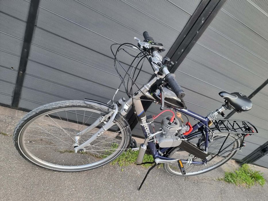 Bicicleta cu motor nou