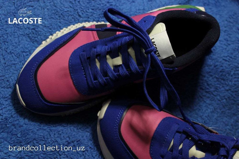 Женские спортивные кроссовки от бренда Lacoste
