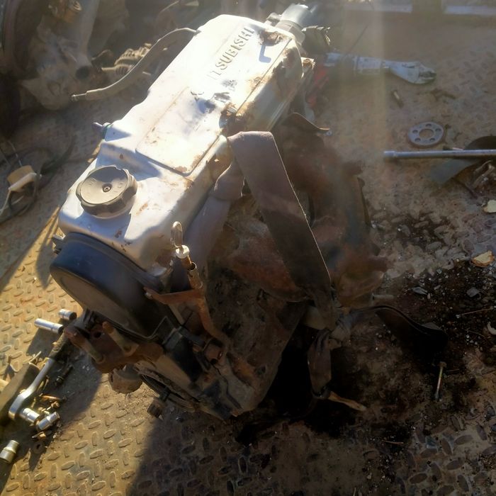 Двиготель митсубиси 4g 13