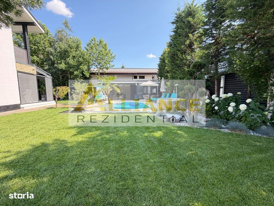 Casa P+1+M cu teren de 650 mp, piscina si curte complet amenajata