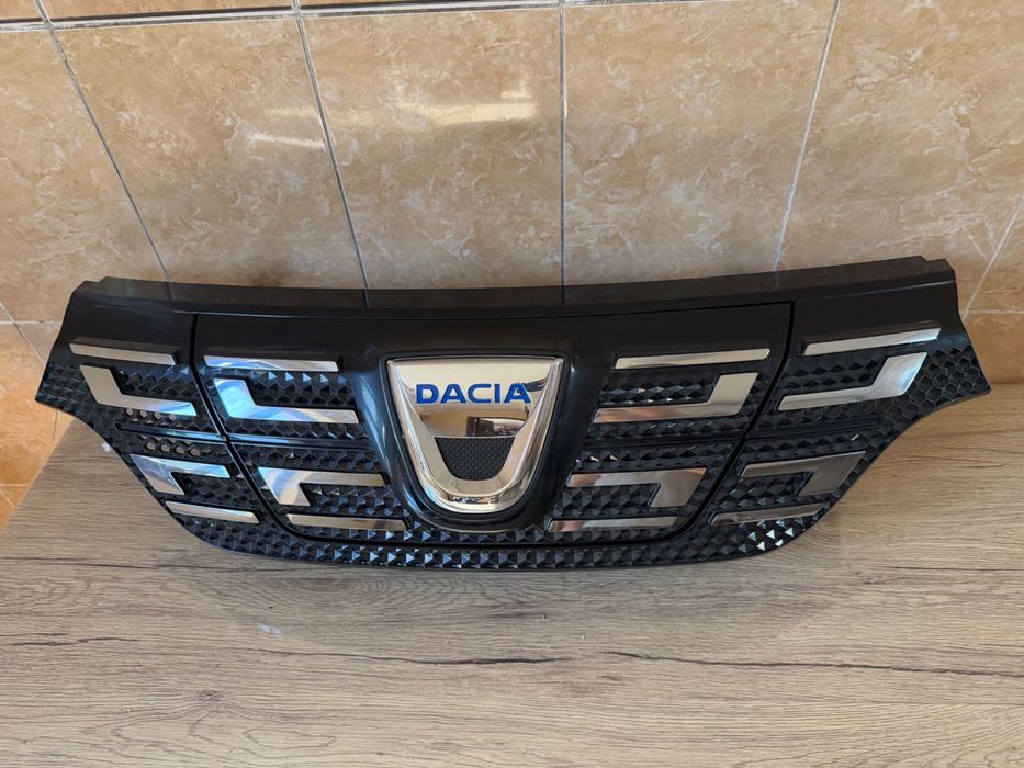 Grila bara fata radiator Dacia Spring originala ca noua - Cod OE 623105273R
