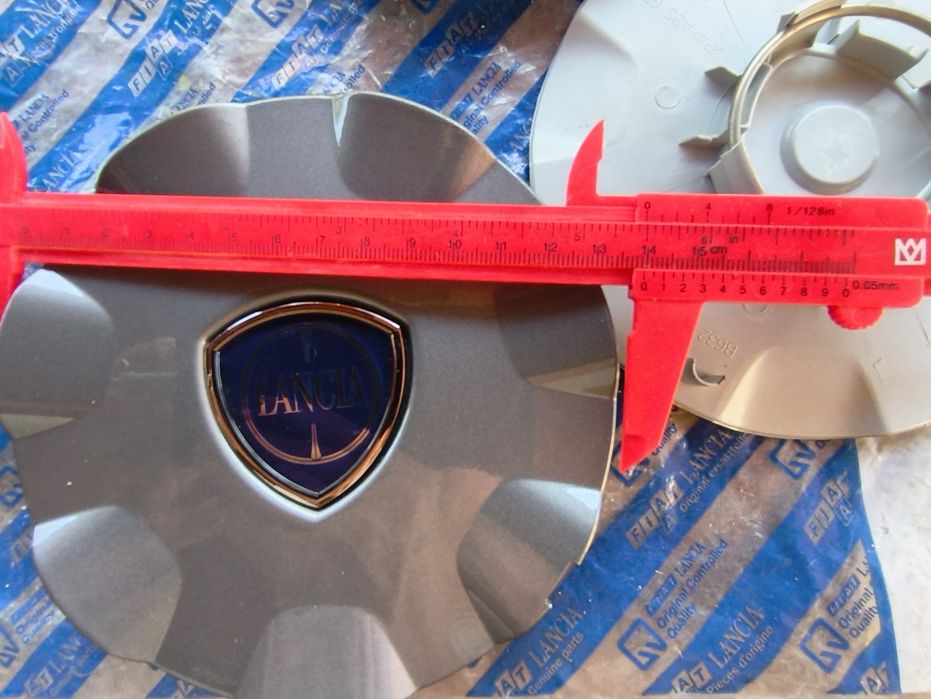 Set 4 capace centrale jante aliaj  Lancia (Delta,  Ypsilon)