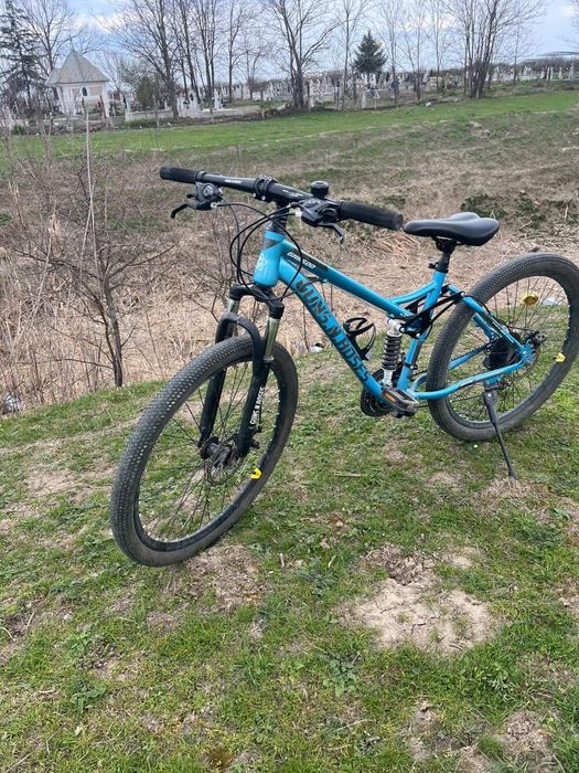 Bicicleta full suspensie