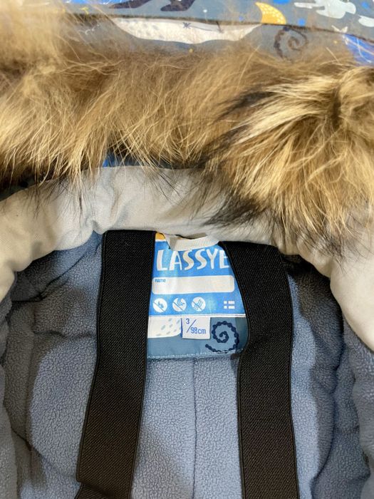 Продам зимний комбинезон Lassye