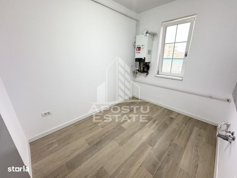 Apartament cu 2 camere decomandat si gradina de 35 mp la asfalt Giroc