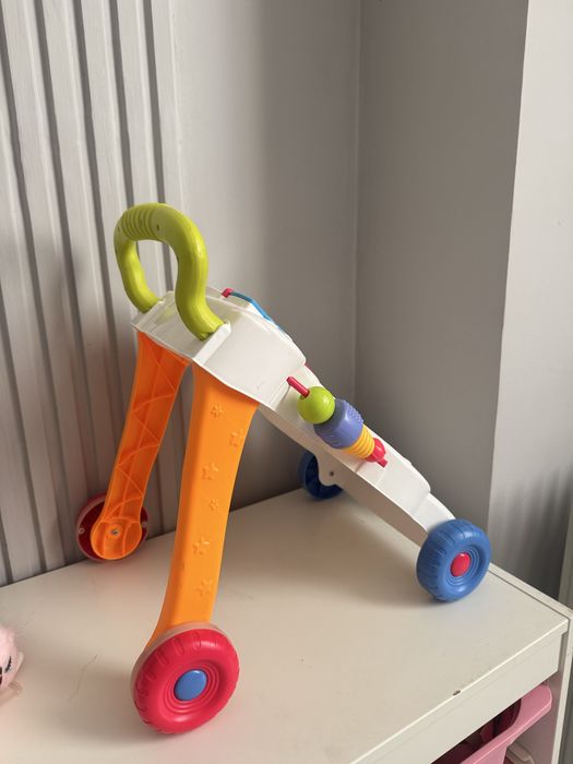 Ходунок игрушка - толкающий ходунок