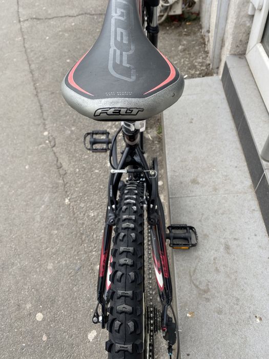 Bicicleta MTB din aluminiu Felt ca nouă, cu 18 viteze