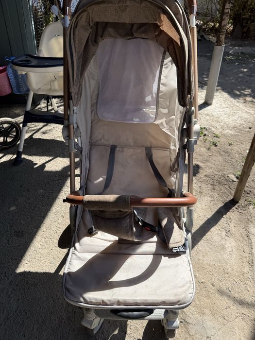 Продам коляску и детский стульчик