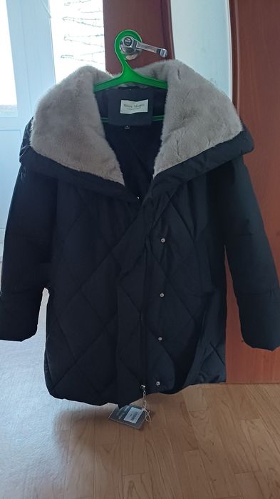 Продам новый пуховик.